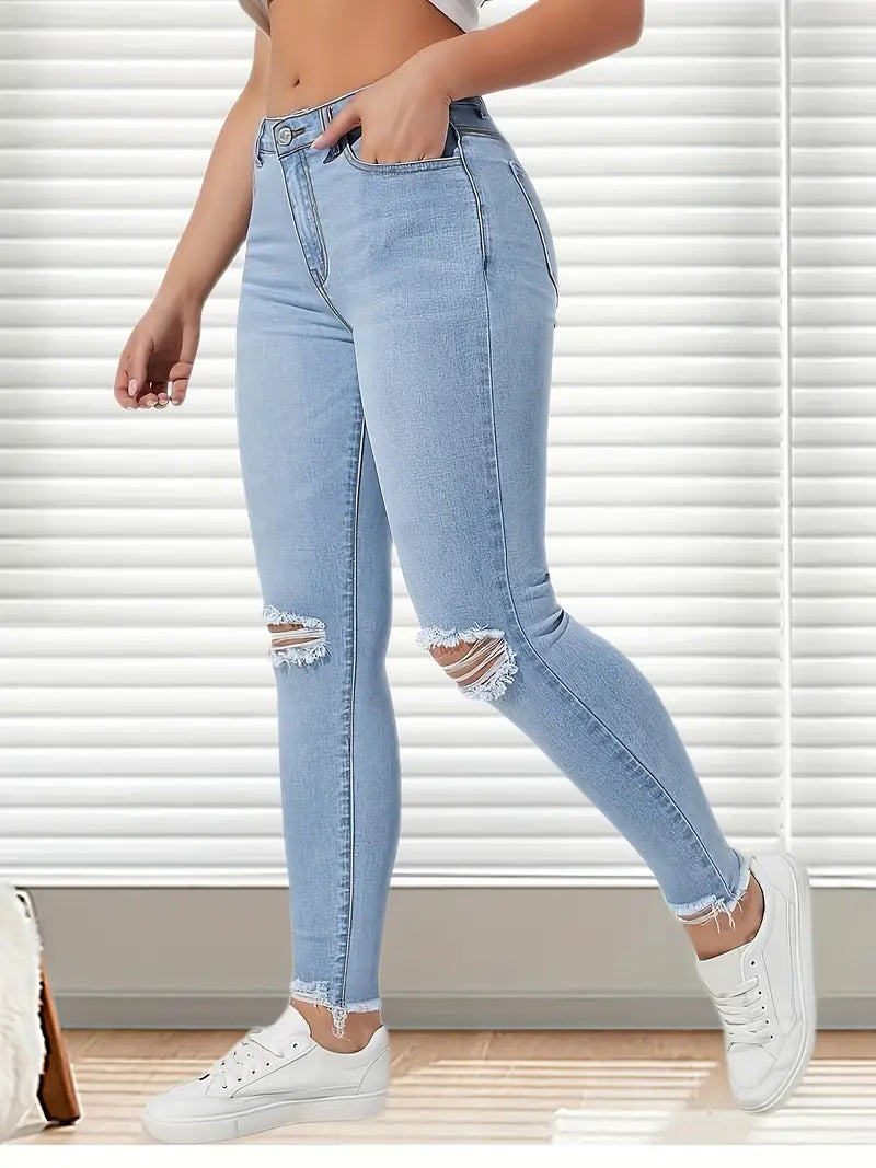 ladies blue distressed jean